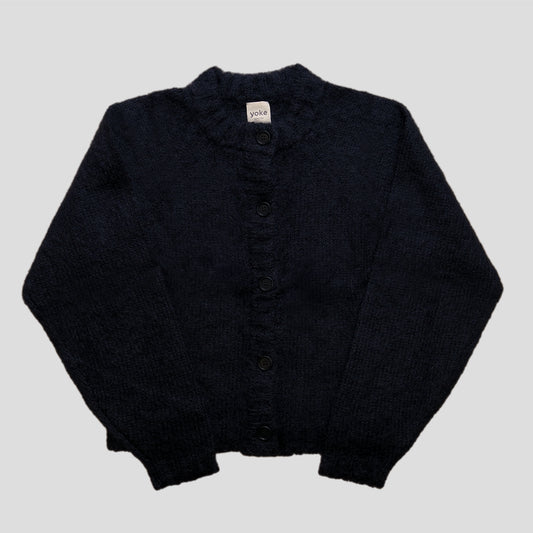 Black cardigan on a white background