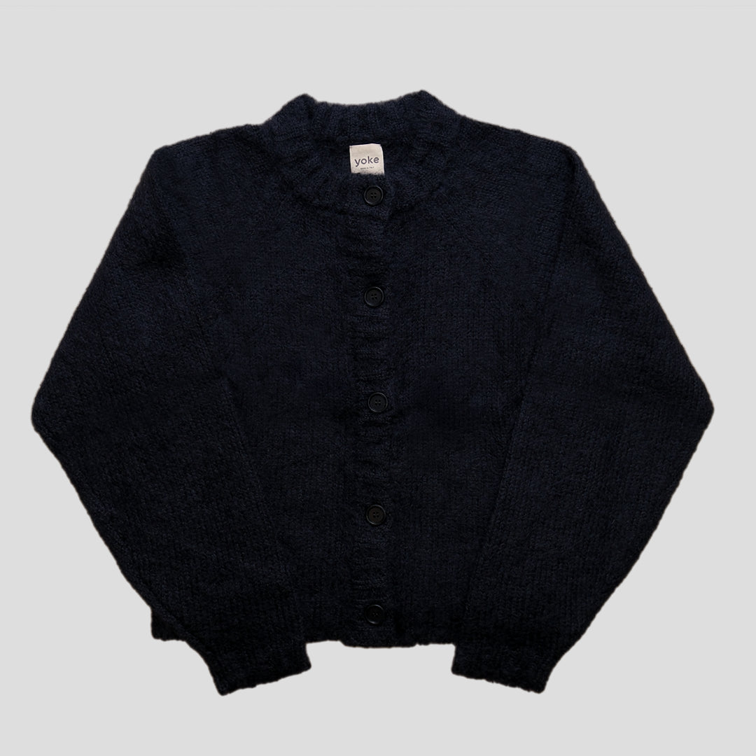 Black cardigan on a white background 